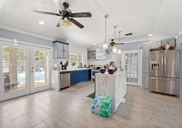 Photo 3 of Single family home for sale at 7033 Tallowtree Ln, Orlando, FL 32835 | MLS# O6393318 | Listing updated on 2026-09-16