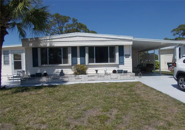 Photo 2 of Manufactured home for sale at 5004 Palena Blvd, North Port, FL 34287 | MLS# C7523891 | Listing updated on 2026-05-22