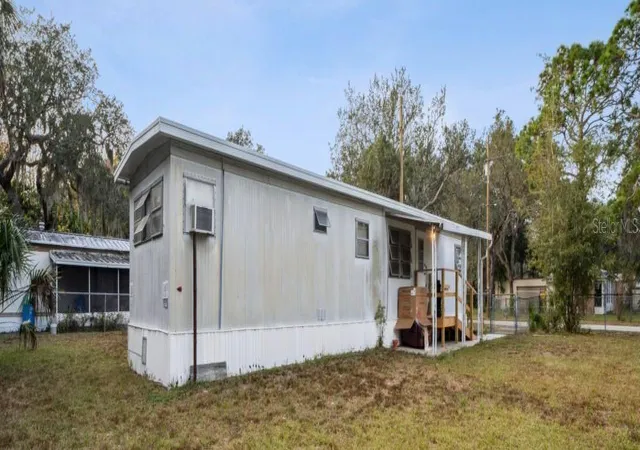 Photo 3 of Manufactured home for sale at 9300 Kiowa Dr, New Port Richey, FL 34654 | MLS# W7884201 | Listing updated on 2026-09-01