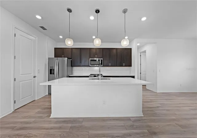Photo 3 of Single family home for sale at 920 Livestock Loop, St Cloud, FL 34771 | MLS# S5146557 | Listing updated on 2026-09-12