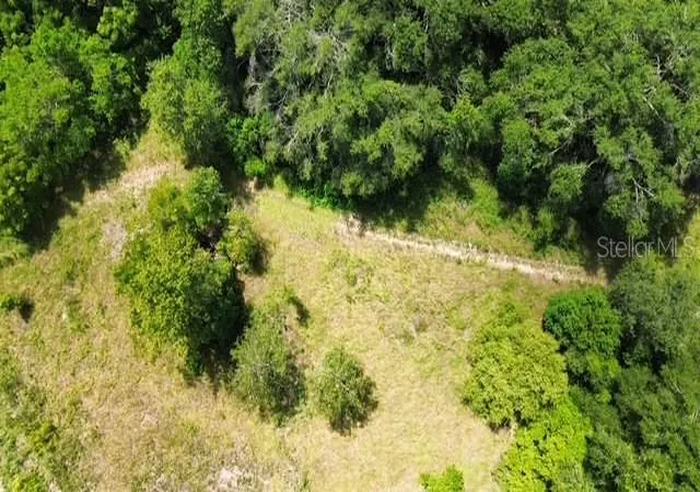 Photo 1 of Land for sale at 4026 N Orange Blossom Trl, Mount Dora, FL 32757 | MLS# O6393994 | Listing updated on 2026-09-15