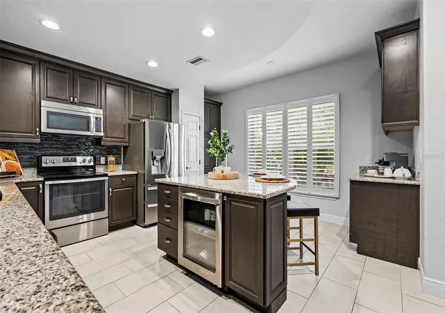Photo 3 of Townhouse for sale at 771 Date Palm Ln, Saint Petersburg, FL 33707 | MLS# TB8491037 | Listing updated on 2026-08-31