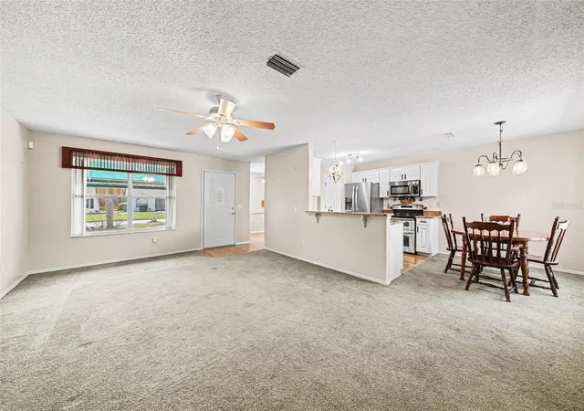 3rd image of 1239 Chaparral Dr, Lady Lake, FL 32159 | MLS# O6394215