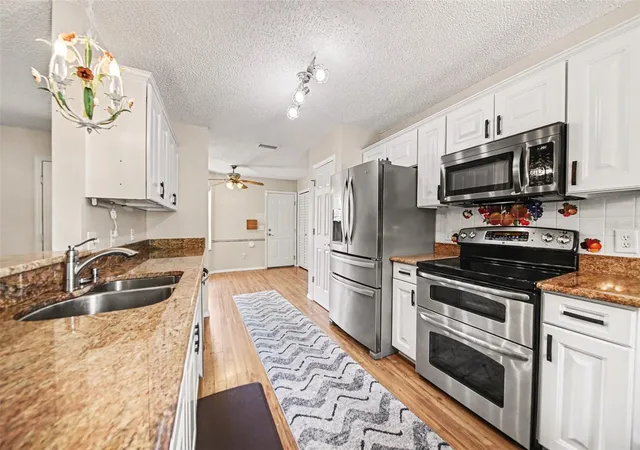 4th image of 1239 Chaparral Dr, Lady Lake, FL 32159 | MLS# O6394215