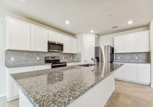 3rd image of 6970 Depue Dr, Wesley Chapel, FL 33545 | MLS# TB8491300