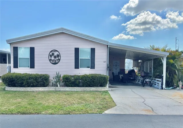 Photo 3 of Manufactured home for sale at 102 Americana Ct Ne #206, Saint Petersburg, FL 33702 | MLS# TB8491401 | Listing updated on 2026-10-21