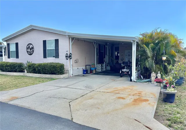 Photo 3 of Manufactured home for sale at 102 Americana Ct NE #206, Saint Petersburg, FL 33702 | MLS# TB8491401 | Listing updated on 2026-10-21