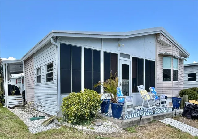 Photo 4 of Manufactured home for sale at 102 Americana Ct NE #206, Saint Petersburg, FL 33702 | MLS# TB8491401 | Listing updated on 2026-10-21