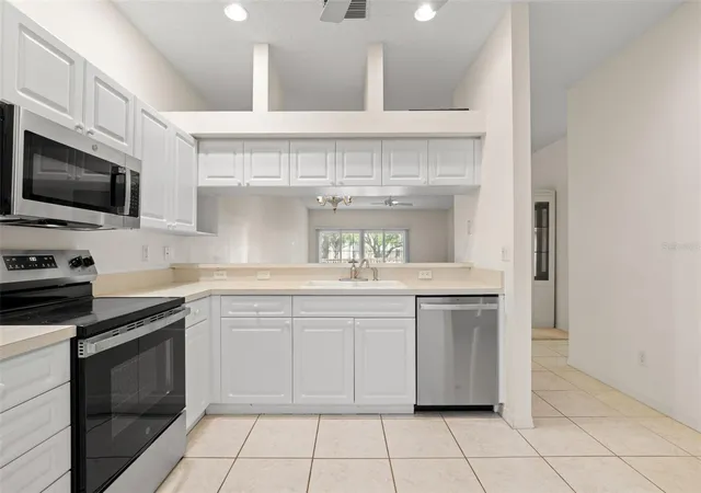 Photo 3 of Condo for sale at 6600 100th Way N #24B, St Petersburg, FL 33708 | MLS# TB8491609 | Listing updated on 2026-10-03