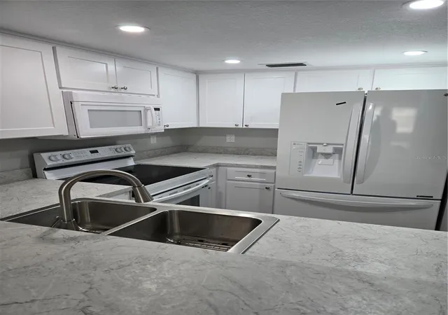 Photo 3 of Condo for sale at 4600 Marine Pkwy #107, New Port Richey, FL 34652 | MLS# TB8491611 | Listing updated on 2026-06-07