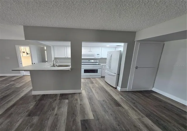 Photo 4 of Condo for sale at 4600 Marine Pkwy #107, New Port Richey, FL 34652 | MLS# TB8491611 | Listing updated on 2026-06-07