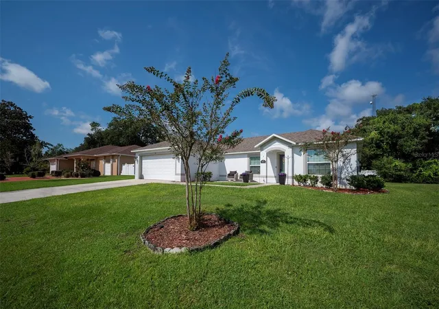 1st image of 45 Woodfield Dr, Palm Coast, FL 32164 | MLS# FC317306