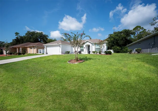 2nd image of 45 Woodfield Dr, Palm Coast, FL 32164 | MLS# FC317306