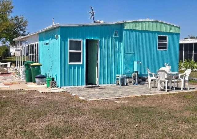 Photo 3 of Manufactured home for sale at 1393 Mallard Dr, Englewood, FL 34224 | MLS# D6146808 | Listing updated on 2026-07-08