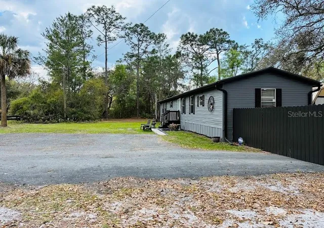 Photo 3 of Manufactured home for sale at 7161 Schering St, Weeki Wachee, FL 34613 | MLS# W7884339 | Listing updated on 2026-05-14