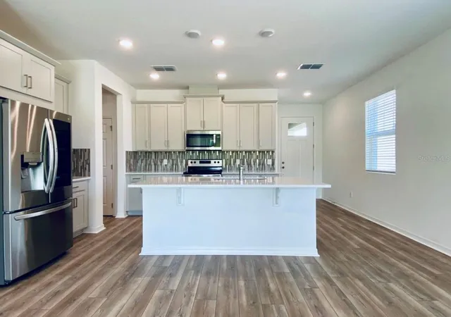 Photo 1 of Townhouse for sale at 2668 Spider Lily Ct, Clermont, FL 34711 | MLS# TB8491767 | Listing updated on 2026-08-31