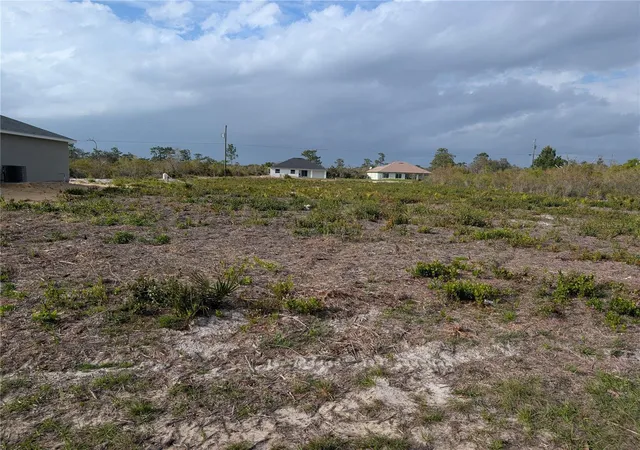 Photo 1 of Land at 12 Poinciana Dr, Indian Lake Estates, FL 33855 | MLS# P4938273 | | Sold on 2026-05-15