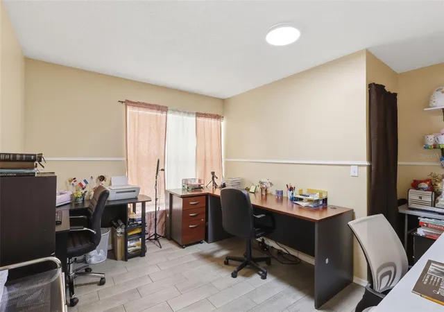 Photo 3 of Single family home for sale at 1142 Normandy Dr, Kissimmee, FL 34759 | MLS# O6394701 | Listing updated on 2026-08-21