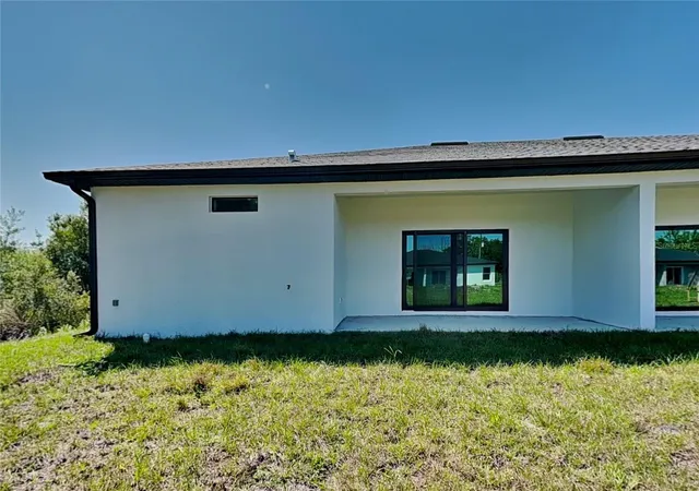 Listing Photo 2 - Condo for sale in building located at 12232-12234 Newgate Ave, PORT CHARLOTTE, FL 33981 - Unit #