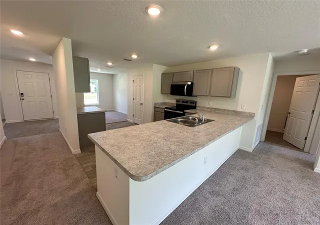 5th image of 48 Rippling Brook Dr, Palm Coast, FL 32164 | MLS# C7524125
