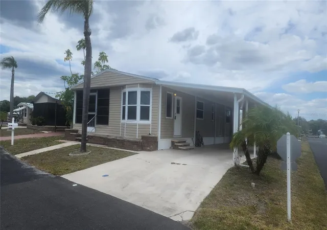 Photo 3 of Manufactured home for sale at 157 N Fiji Cir, Englewood, FL 34223 | MLS# A4688132 | Listing updated on 2026-10-01
