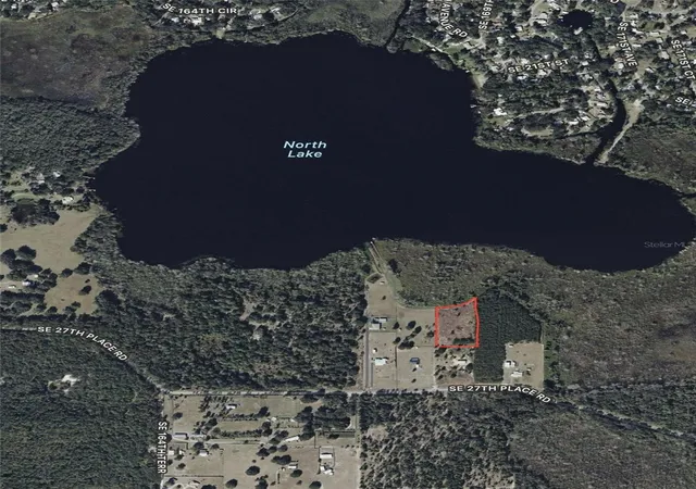 1st image of 16865 Se 27th Pl Rd, Ocklawaha, FL 32179 | MLS# NS1087793