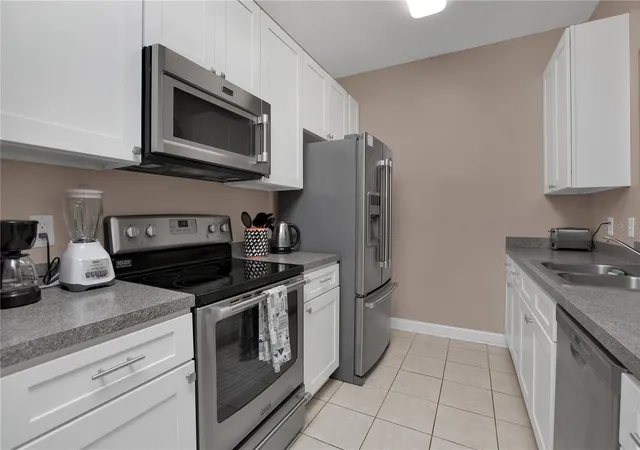 Listing Photo 4 - Condo for sale in building located at 3190 Dante Dr, Orlando, FL 32835 - Unit #304