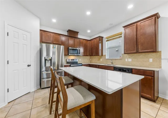 Photo 4 of Single family home for sale at 12216 Prairie Plantation Way, Orlando, FL 32824 | MLS# O6395022 | Listing updated on 2026-09-21