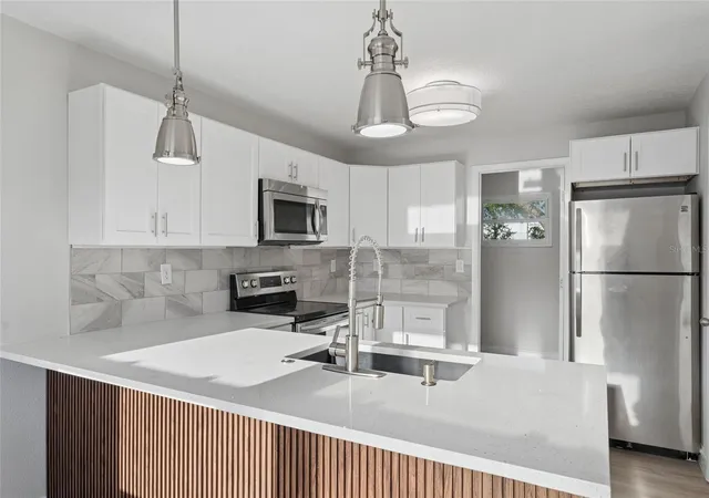 3rd image of 2105 9Th St Ne, Winter Haven, FL 33881 | MLS# O6395140