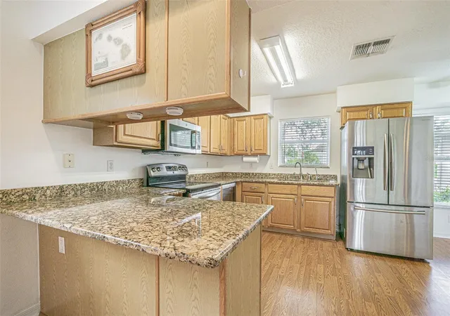 Photo 3 of Single family home for sale at 11204 Corey Pavin Ln, San Antonio, FL 33576 | MLS# TB8492493 | Listing updated on 2026-08-03