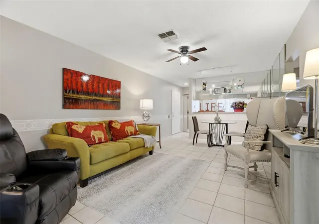 Photo 1 of Condo for sale at 5265 E Bay Dr #410, Clearwater, FL 33764 | MLS# TB8492734 | Listing updated on 2026-09-16