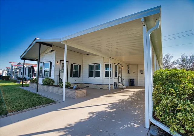 Photo 3 of Manufactured home for sale at 424 Tarde Logo Cir, North Port, FL 34287 | MLS# TB8492886 | Listing updated on 2026-09-22