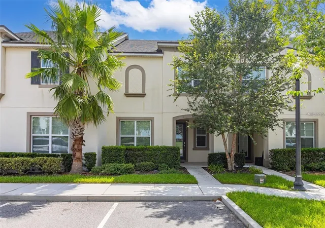 Photo 1 of Townhouse for sale at 1594 Carey Palm Cir, Kissimmee, FL 34747 | MLS# O6395507 | Listing updated on 2026-04-02