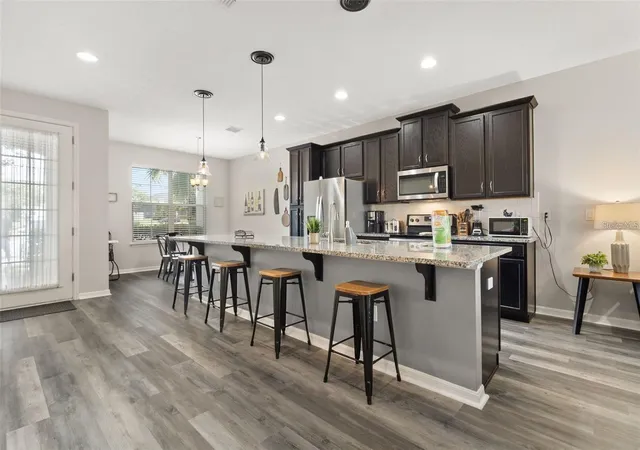 Photo 4 of Townhouse for sale at 1594 Carey Palm Cir, Kissimmee, FL 34747 | MLS# O6395507 | Listing updated on 2026-04-02