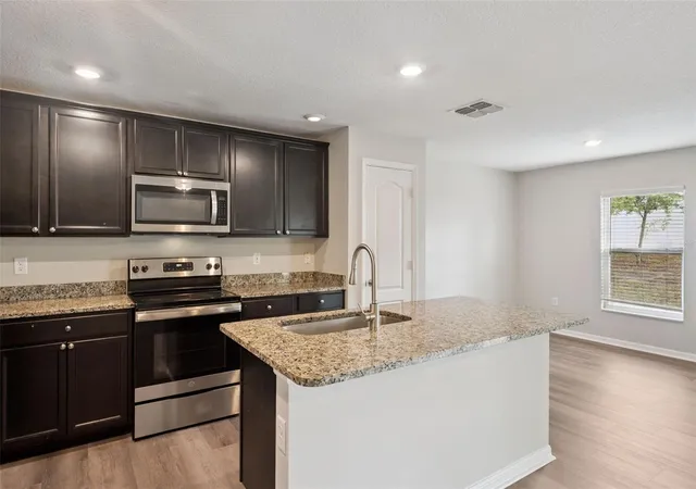 5th image of 12019 Indian Grass Wy, Leesburg, FL 34788 | MLS# O6395615