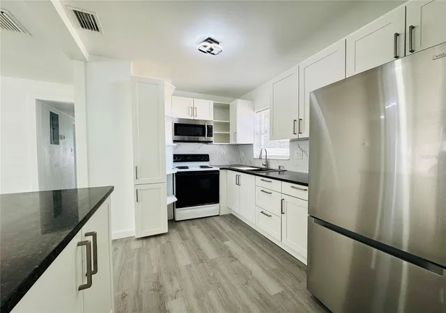 Photo 3 of Single family home for sale at 136 Lynbrook Dr, Orlando, FL 32807 | MLS# S5147011 | Listing updated on 2026-09-19