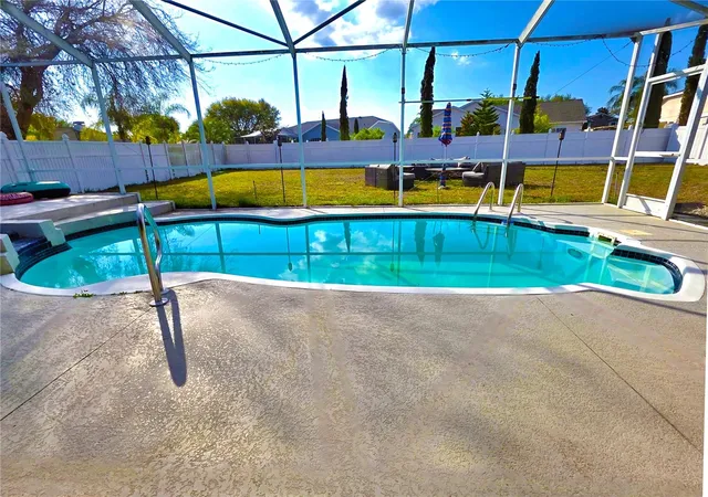 5th image of 7927 Roundelay Dr, New Port Richey, FL 34654 | MLS# TB8493202