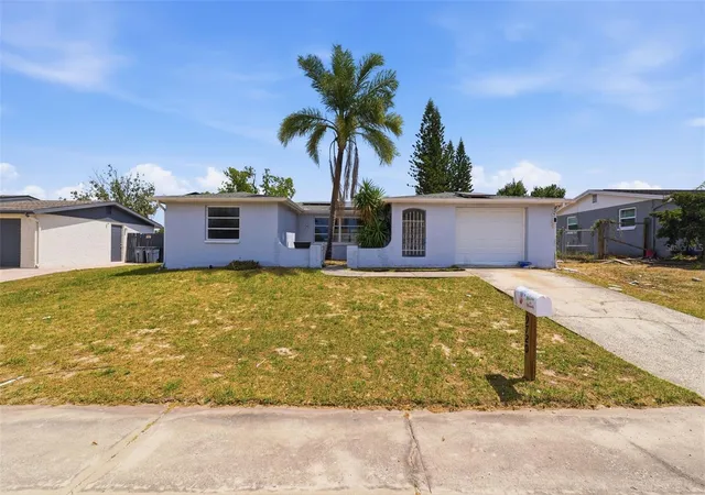 Photo 2 of Single family home for sale at 9720 Rainbow Ln, Port Richey, FL 34668 | MLS# W7884459 | Listing updated on 2026-09-25
