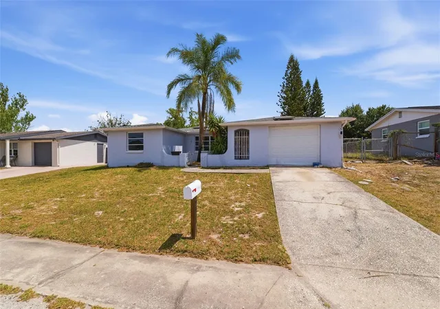 Photo 3 of Single family home for sale at 9720 Rainbow Ln, Port Richey, FL 34668 | MLS# W7884459 | Listing updated on 2026-09-25