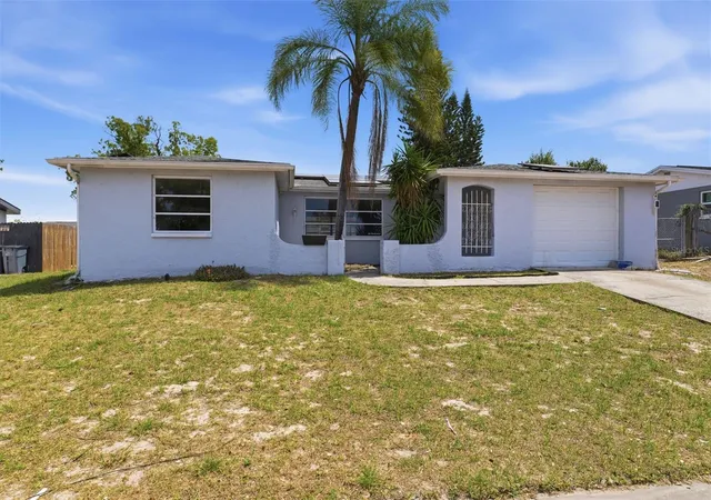 Photo 3 of Single family home for sale at 9720 Rainbow Ln, Port Richey, FL 34668 | MLS# W7884459 | Listing updated on 2026-09-25