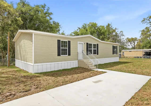 Photo 5 of Manufactured home for sale at 12015 Westbay Ave, New Port Richey, FL 34654 | MLS# TB8493271 | Listing updated on 2026-08-20