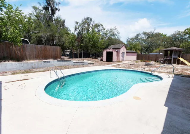 Photo 3 of Single family home for sale at 9939 Woodridge Ct, Port Richey, FL 34668 | MLS# W7884476 | Listing updated on 2026-10-07