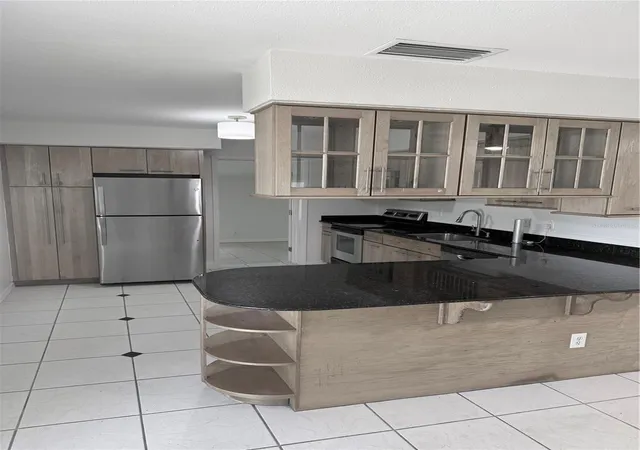Photo 4 of Single family home for sale at 2911 Pafko Dr, Sarasota, FL 34232 | MLS# A4688619 | Listing updated on 2026-09-12