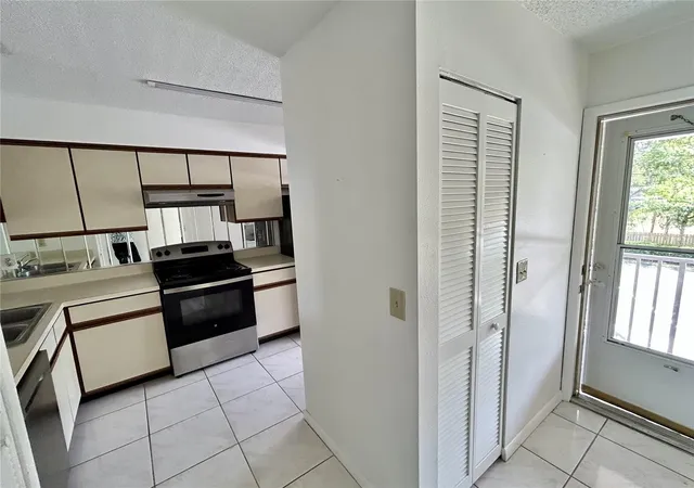 Listing Photo 5 - Condo for sale in building located at 6519 Spring Flower Dr, NEW PORT RICHEY, FL 34653 - Unit #24