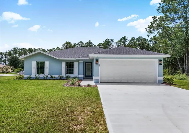 Photo 2 of Single family home for sale at 52 Roxboro Dr, Palm Coast, FL 32164 | MLS# FC317437 | Listing updated on 2026-09-05