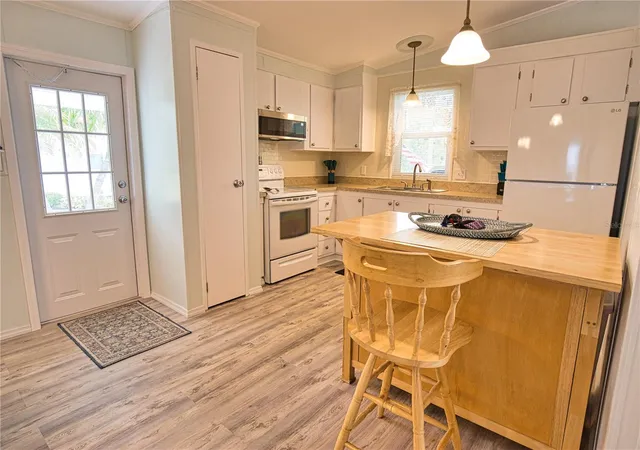 Photo 3 of Manufactured home for sale at 618 Iglesia Dr, North Port, FL 34287 | MLS# TB8493528 | Listing updated on 2026-09-22