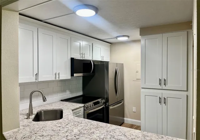 2nd image of 1423 Pine Glen Ln #H2, Tarpon Springs, FL 34688 | MLS# W7884515