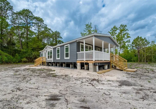 Photo 3 of Manufactured home for sale at 14823 SE County Rd 100a, Starke, FL 32091 | MLS# GC539124 | Listing updated on 2026-09-11