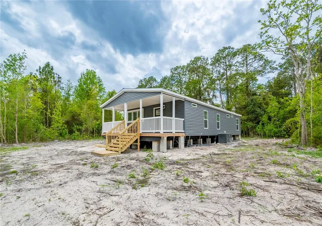 Photo 4 of Manufactured home for sale at 14823 SE County Rd 100a, Starke, FL 32091 | MLS# GC539124 | Listing updated on 2026-09-11