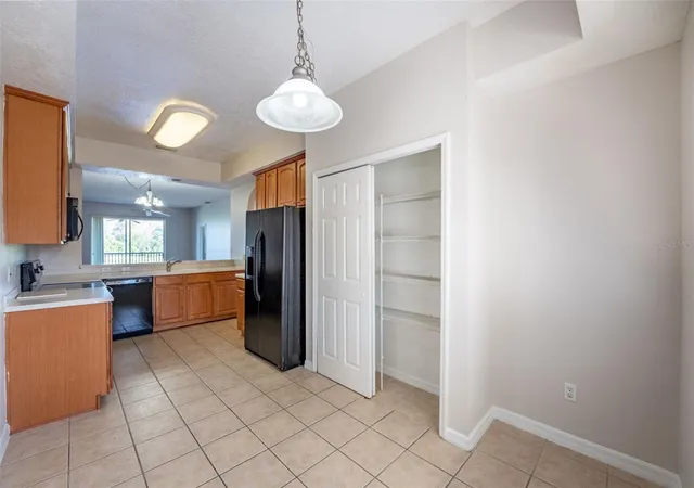 Listing Photo 4 - Condo for sale in building located at 9435 Myrtle Creek Ln, Orlando, FL 32832 - Unit #311